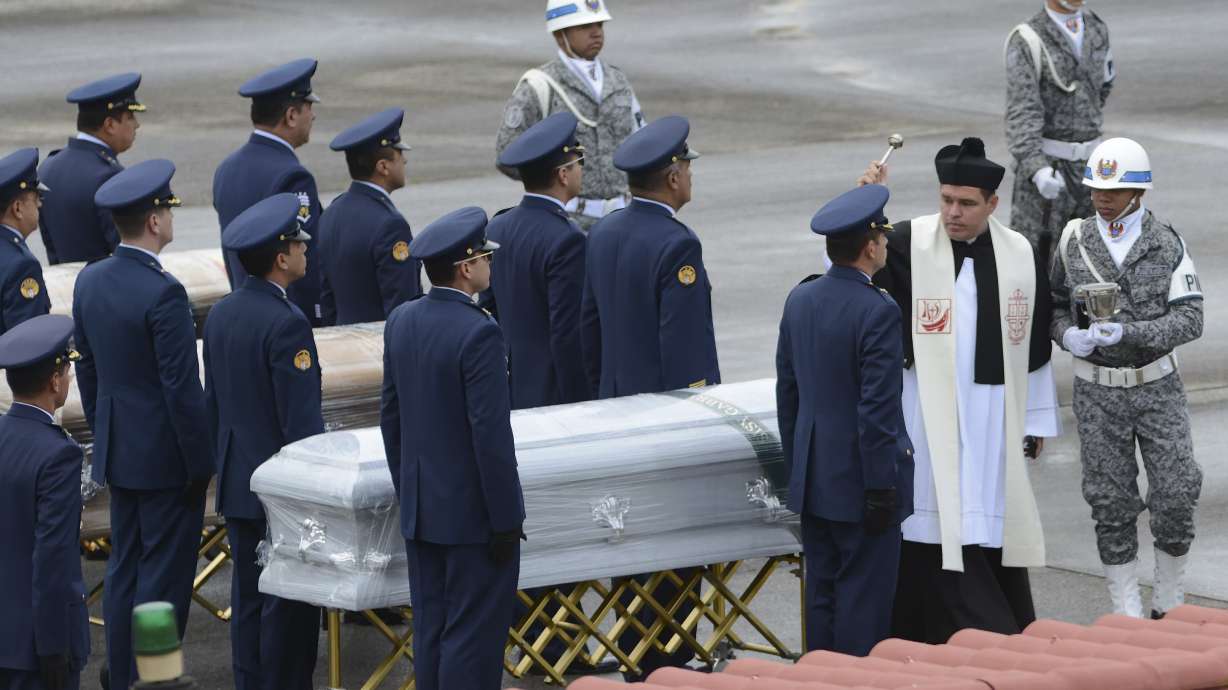 The Latest: Colombia repatriates dead, crash investigated