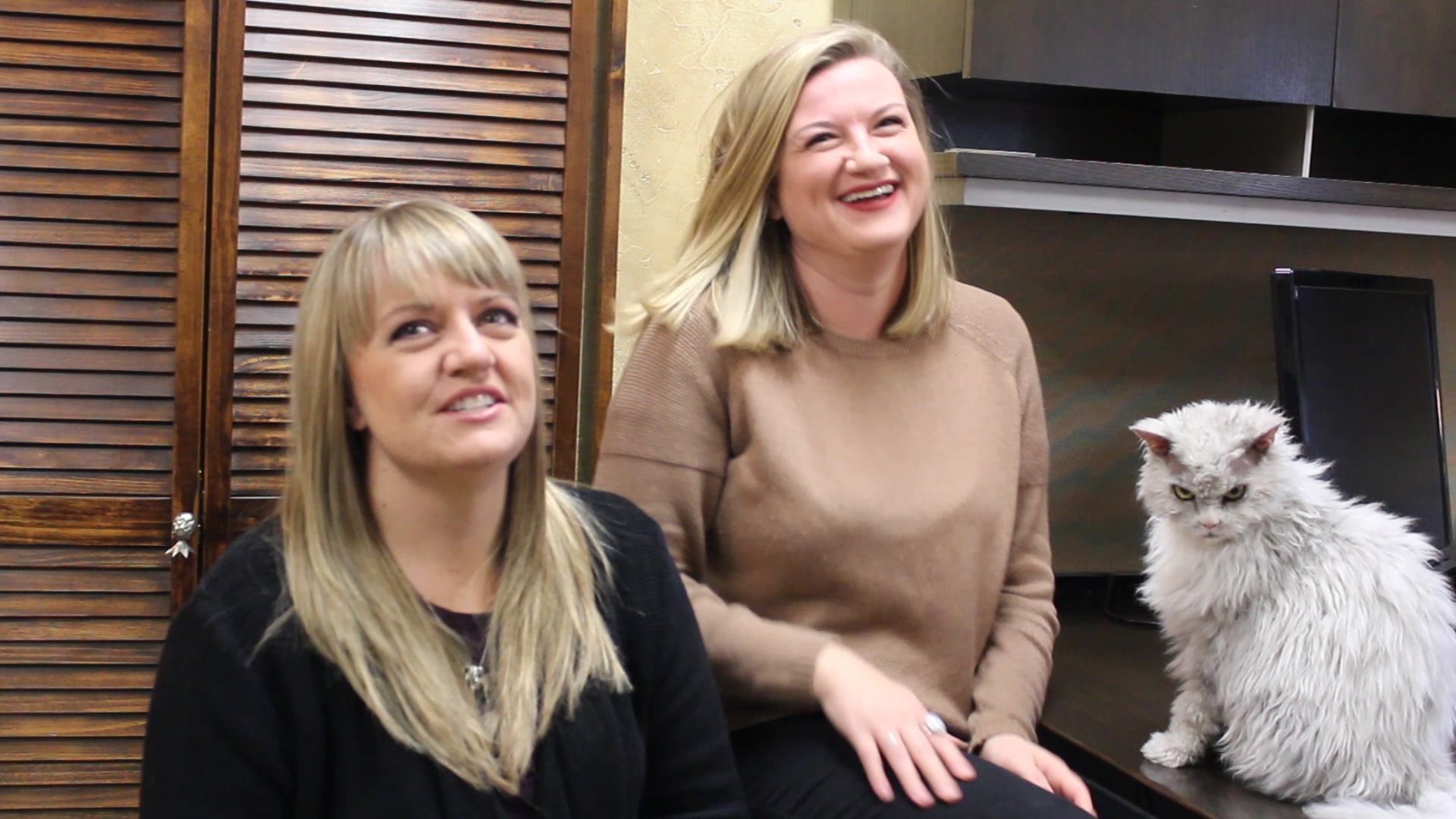 Deana Peat, left, and Ashley Hutchins, right, laugh when describing what it's like working with Albert (Photo: Carter Williams, KSL.com)