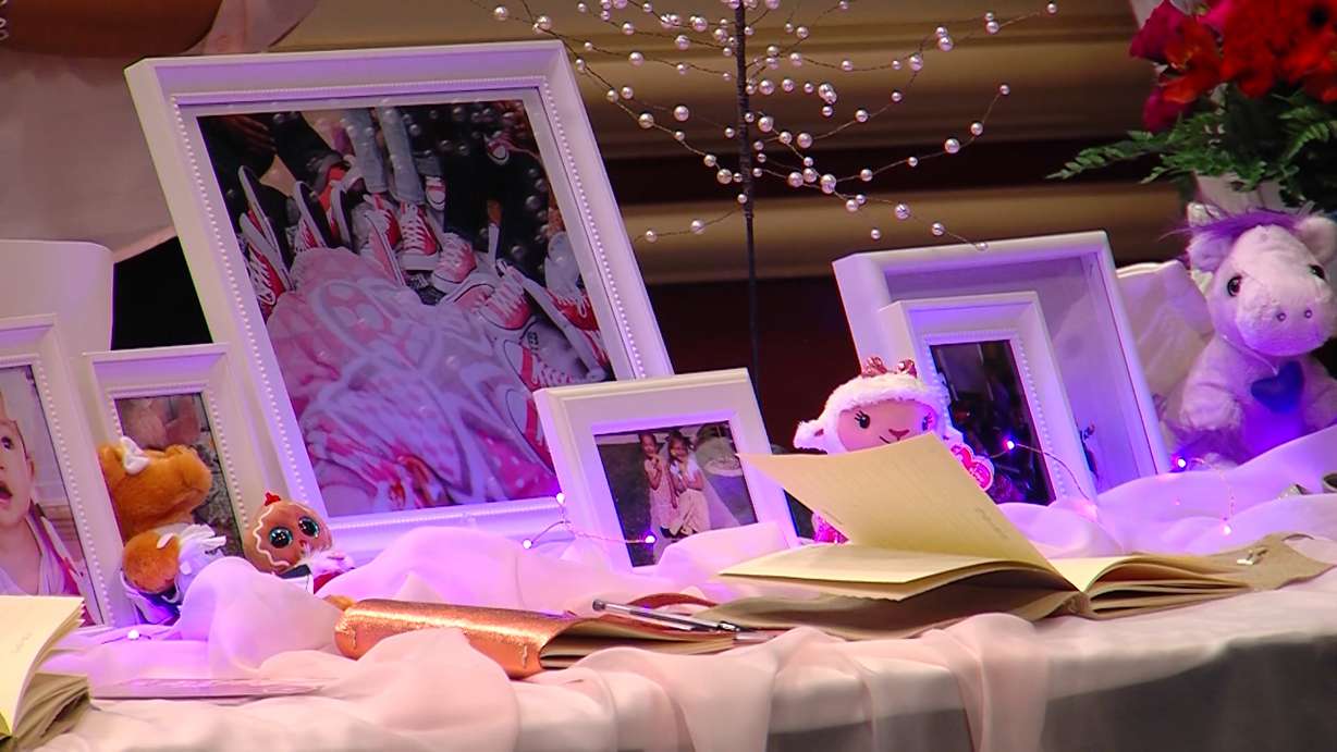 Hundreds of people stopped by the Salt Palace Friday Dec. 9, 2016, in an overwhelming show of support for BYU assistant football coach Reno Mahe and his family at a memorial for his 3-year-old daughter Elsie who died after a tragic home accident.