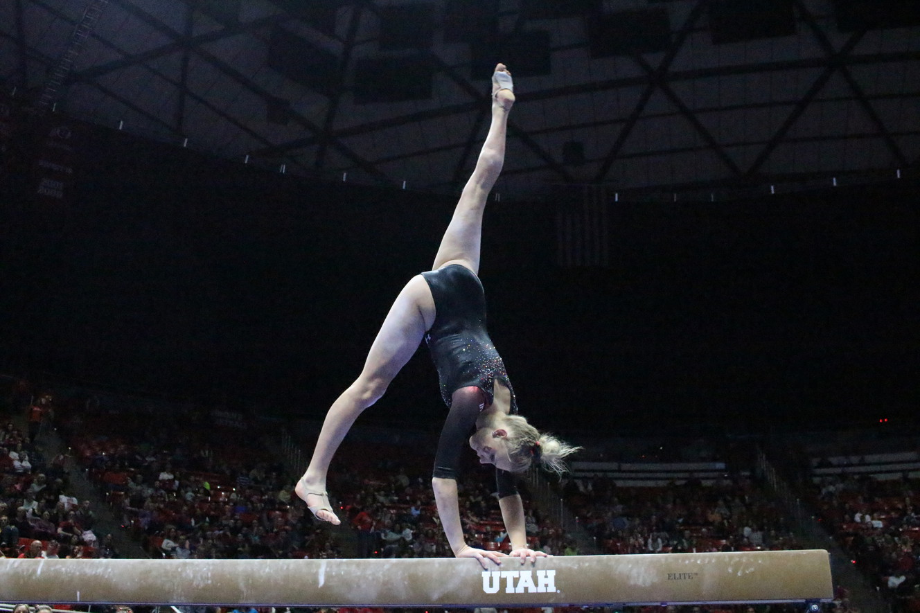 Sophomore MaKenna Merrell performs on balance beam during the Red Rocks' annual preseason preview Friday, Dec. 9, 2016, at the Huntsman Center in Salt Lake City. (Photo: Holli Joyce, KSL.com)