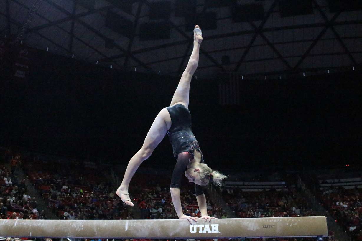 Sophomore MaKenna Merrell performs on balance beam during the Red Rocks' annual preseason preview Friday, Dec. 9, 2016, at the Huntsman Center in Salt Lake City. (Photo: Holli Joyce, KSL.com)
