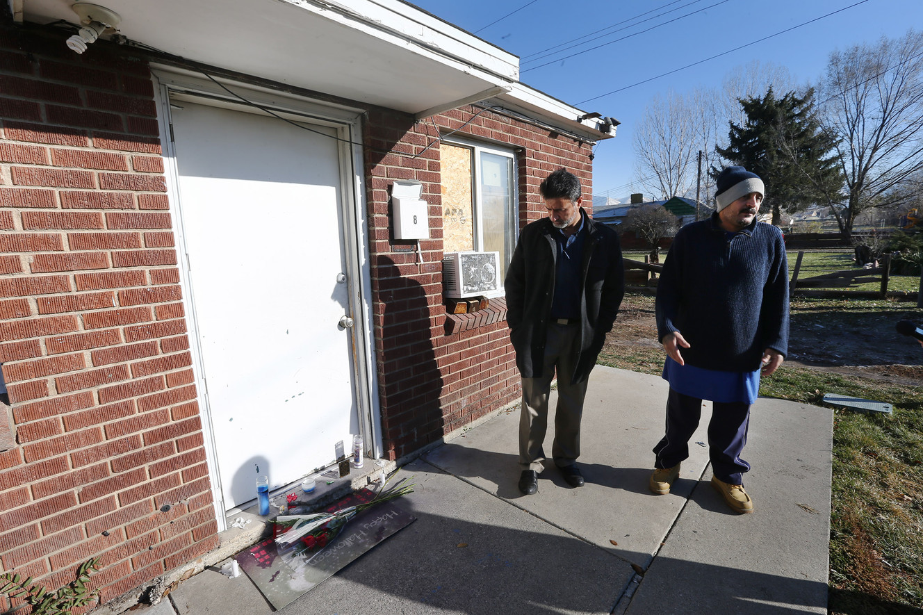 Mustafa Alhussaini and Fahim Albakwi talk outside the home their friend Alaa Alkhatawi in Millcreek on Monday, Dec. 12, 2016. The Court of Appeals affirmed a verdict on Feb. 9, ruling that Karrar Suhail was guilty of murdering Alkhatawi.