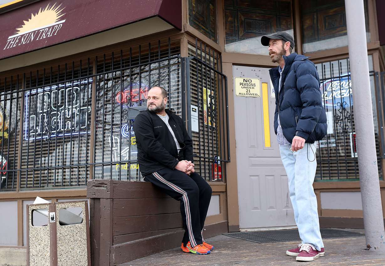 Michael Repp, door security, and Frank Chugg, owner, chat outside The Sun Trap in Salt Lake City on Tuesday, Dec. 13, 2016. The Sun Trap is located on the same block as the site for one of four new homeless resource centers, 648 W. 100 South. (Photo: Kristin Murphy, Deseret News)