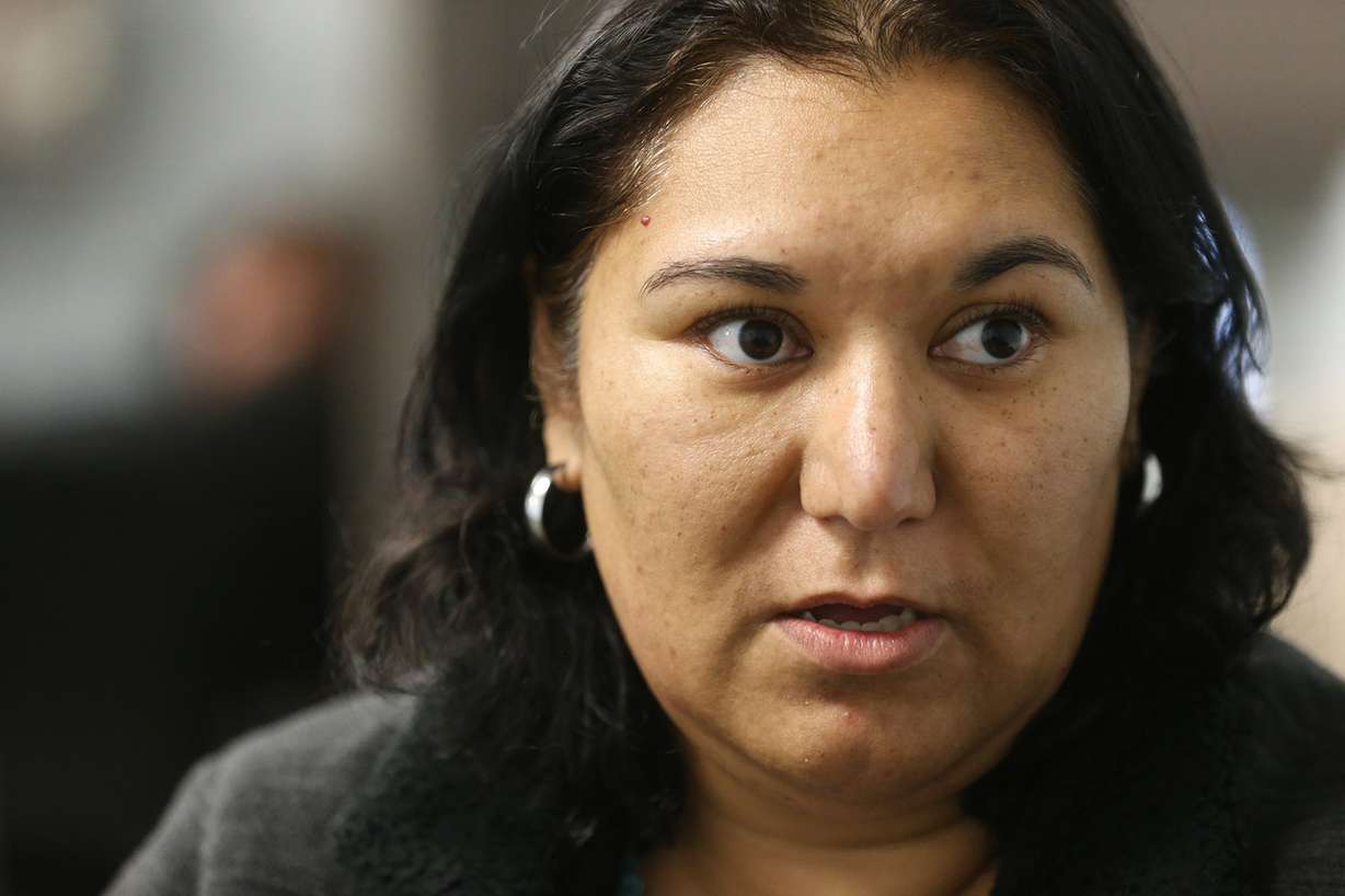 Gabriela Barrera talks about why she signed up for health care plan at the Utah Health Policy Project in West Valley City on Wednesday, Dec. 14, 2016. (Photo: Scott G Winterton, Deseret News)