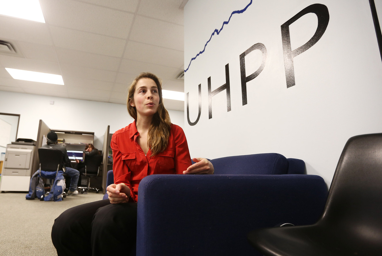 Laura Holdrege talks about what she and other employees at the Utah Health Policy Project do to assist clients in choosing health care plans on Wednesday, Dec. 14, 2016, in West Valley City. (Photo: Scott G Winterton, Deseret News)