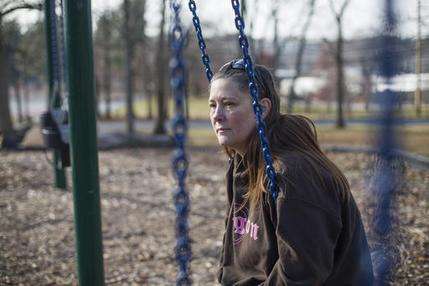 Teka Russell sits in East Frankfort Park in Frankfort, Ky., on Saturday, Dec. 10, 2016. She has many special memories with her son, D'nomyar "Denom" Russell, at the park. The 16-year old was fatally shot on Christmas 2014 by his older brother with a new gun he had received hours earlier; the shooting was ruled to be an accident and no charges were filed. (AP Photo/David Stephenson)