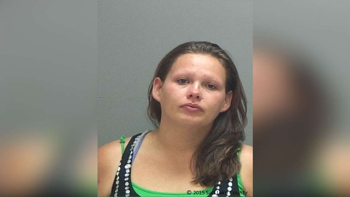 Woman, 1 of 4 charged with murder in robbery, admits to reduced charge