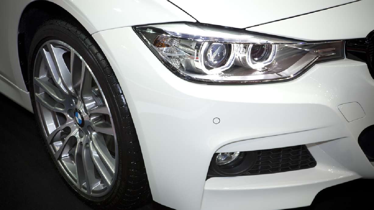 Brothers save for 5 years, surprise mom with BMW