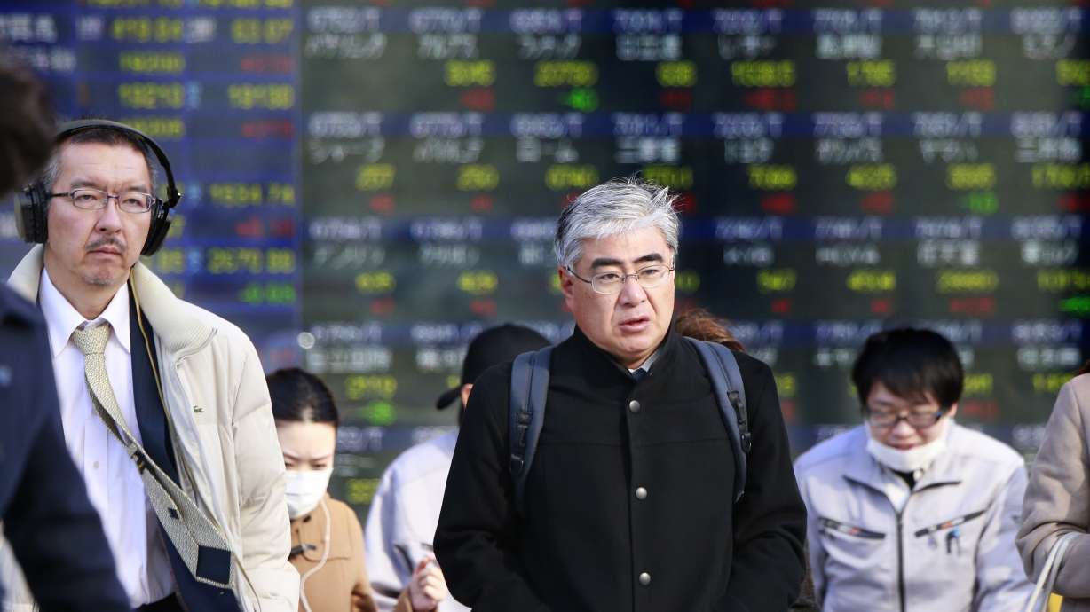 Global stocks steady as Nasdaq hits record high