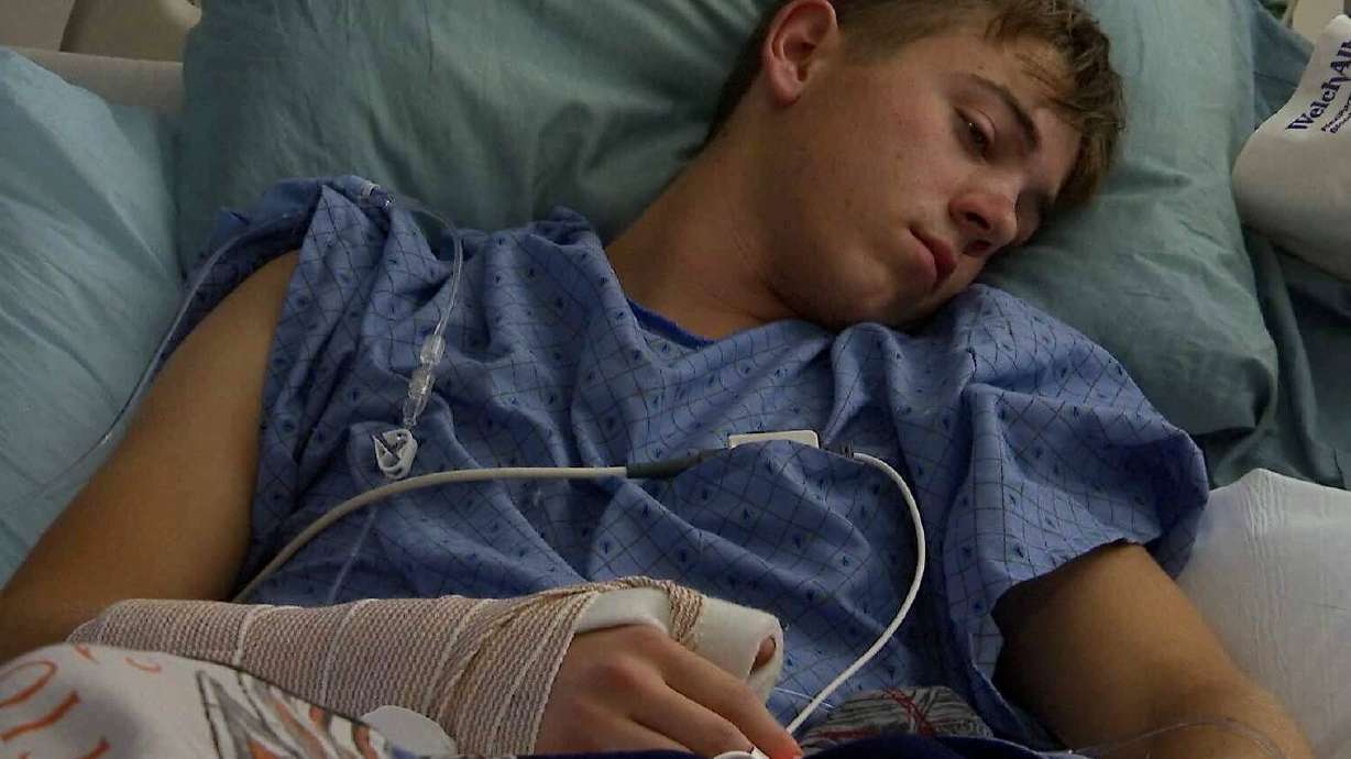 Teen hospitalized after falling off 2-story house while removing Christmas lights