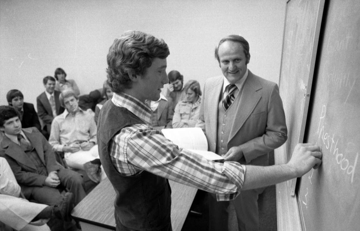 BYU head football coach Lavell Edwards instructs during priests quorum in December 1976. (Photo: Paul Barker, Deseret News)