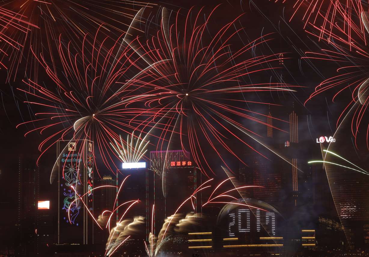Fireworks explode over Victoria Harbour to celebrate the New Year's Eve in Hong Kong, early Sunday, Jan. 1, 2017. (Vincent Yu, AP Photo)