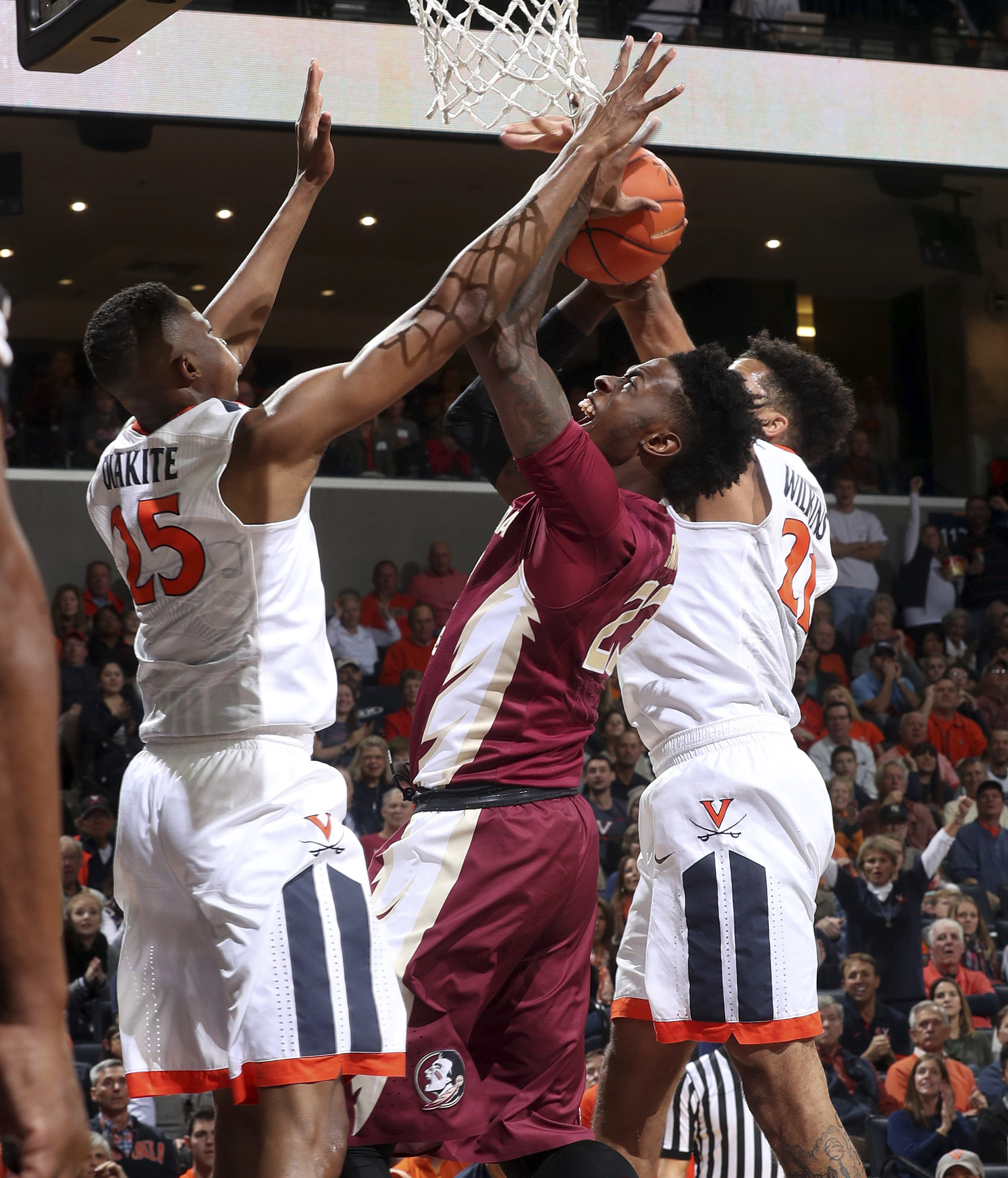 Bacon leads No. 20 Seminoles past No. 12 Virginia, 60-58