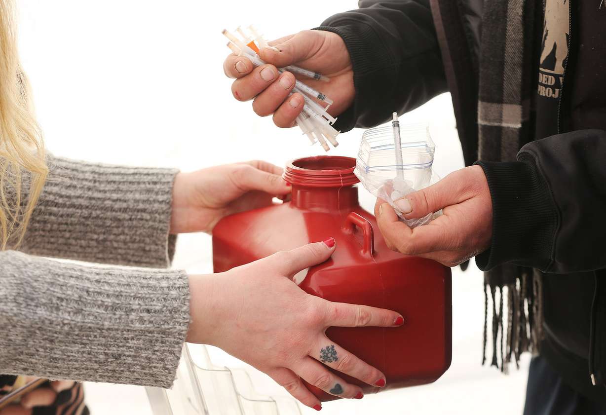 Syringes are handed out during an exchange program in Salt Lake City on Thursday, Dec. 29, 2016. Social worker Mindy Vincent, a former drug addict who is now clean, runs the first syringe exchange program in Utah. (Photo: Jeffrey D. Allred, Deseret News)