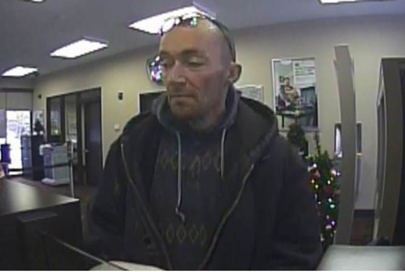 Police looking for alleged bank robber who was arrested for robbing same bank 13 years ago