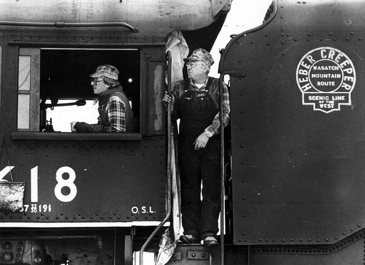 Mark Rounds, left, and Doug Brown travel the Heber Creeper tracks, as the tourist railroad is being supported by 3 local counties. Feb. 25, 1987 (Photo: Deseret News Archives)