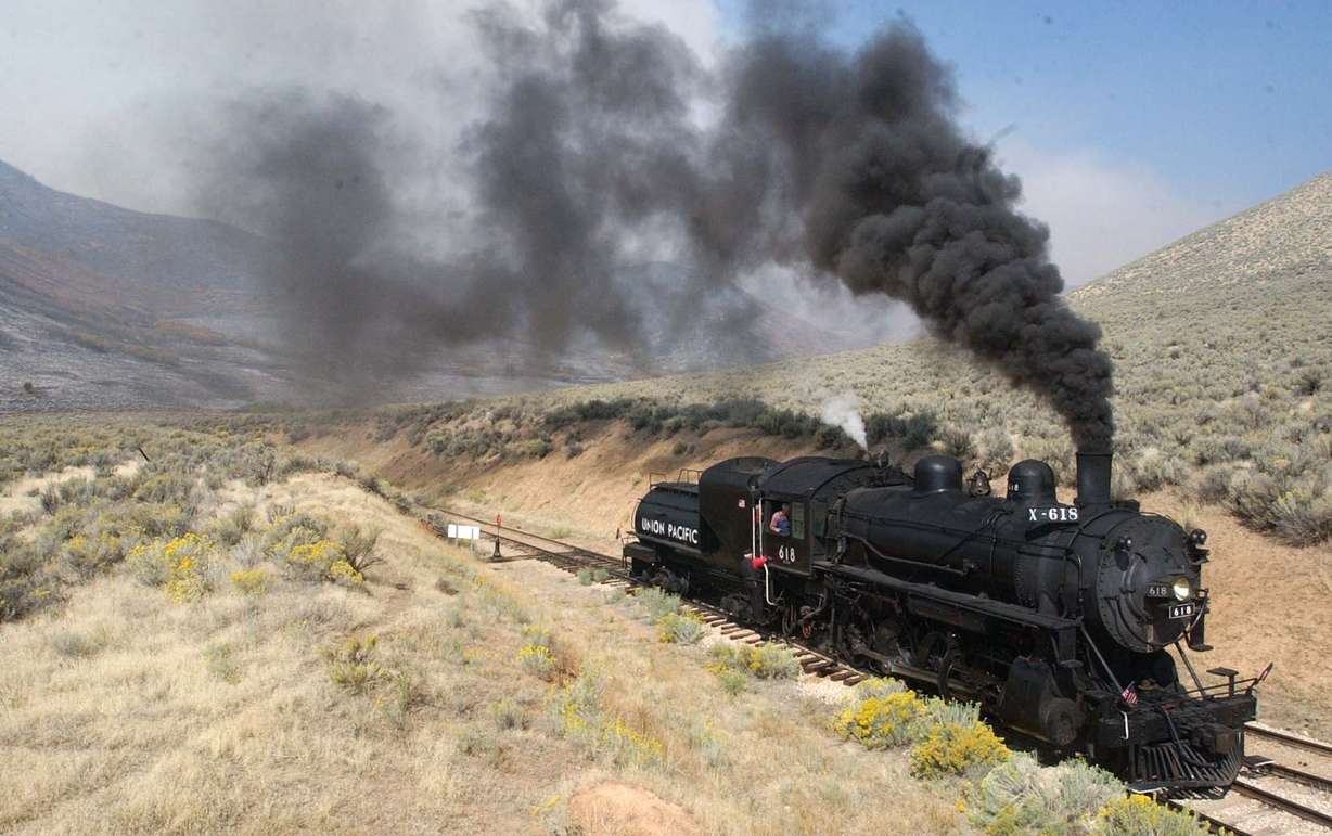 Engineer Chris Hawkins trades the locomotive to the other end of the Heber Valley Railroad for the trip back to the station September 26, 2003 in Heber, Utah. (Photo: Deseret News Archives)