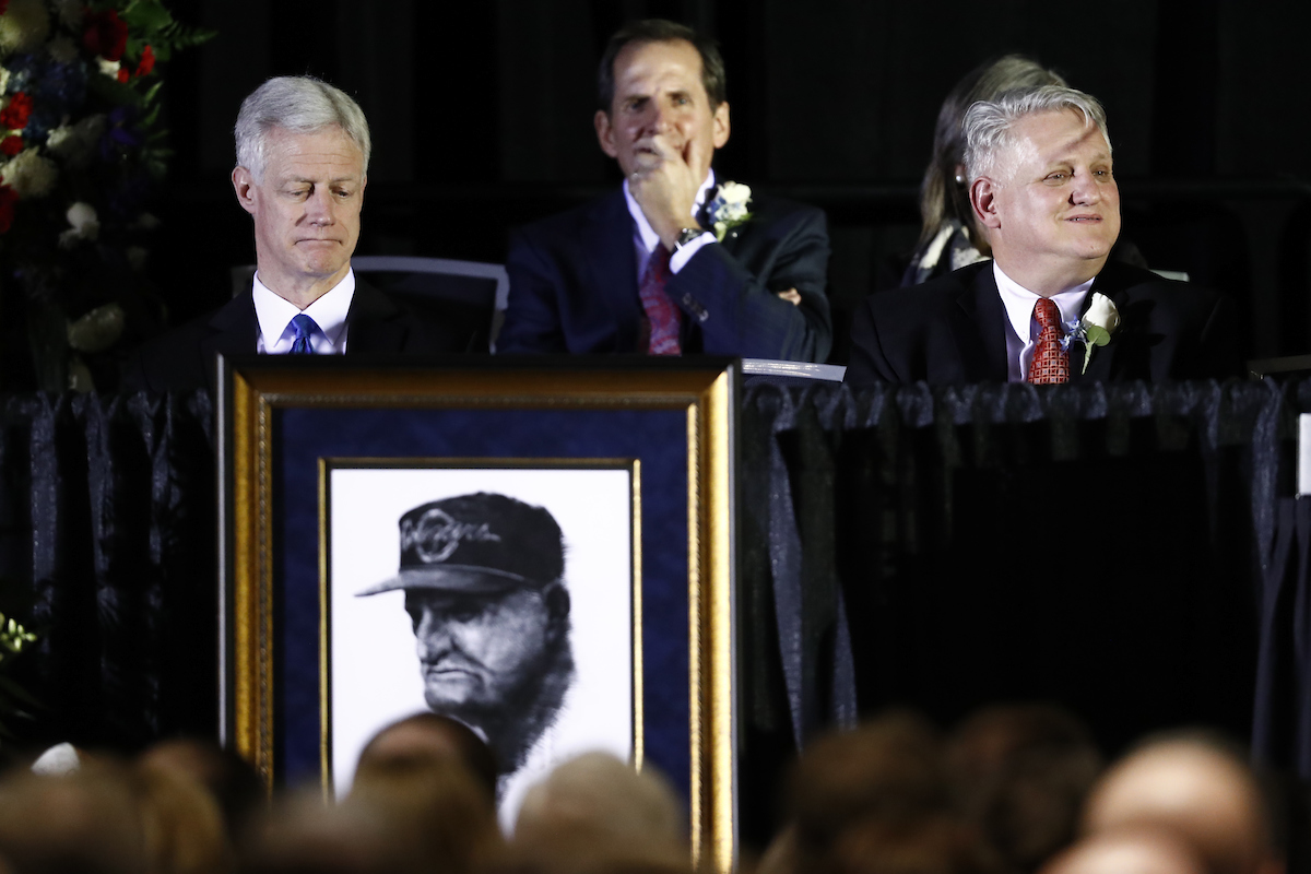 BYU president Kevin J. Worthen, left, with John and Jimmy Edwards at the memorial service of former BYU football coach LaVell Edwards, Jan. 7, 2017 at the Utah Valley Convention Center. (Photo: BYU Photo)