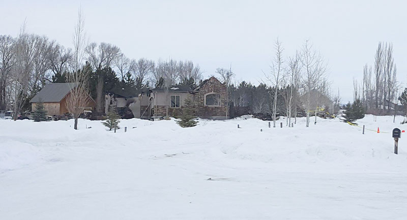 When Misty and Wade Gordon were out of town Friday for a funeral, they weren’t expecting to return to the charred remains of their Rexburg, Idaho, home. (Photo: EastIdahoNews.com)