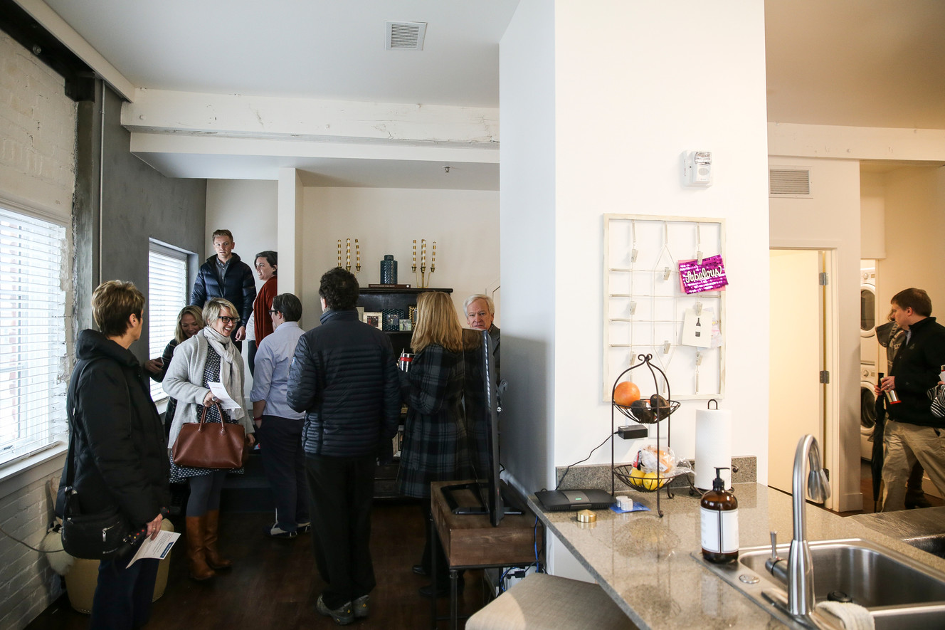 People tour an apartment during the opening of the Artspace Macaroni Flats in Salt Lake City on Thursday, Jan. 12, 2017. (Photo: Spenser Heaps, Deseret News)