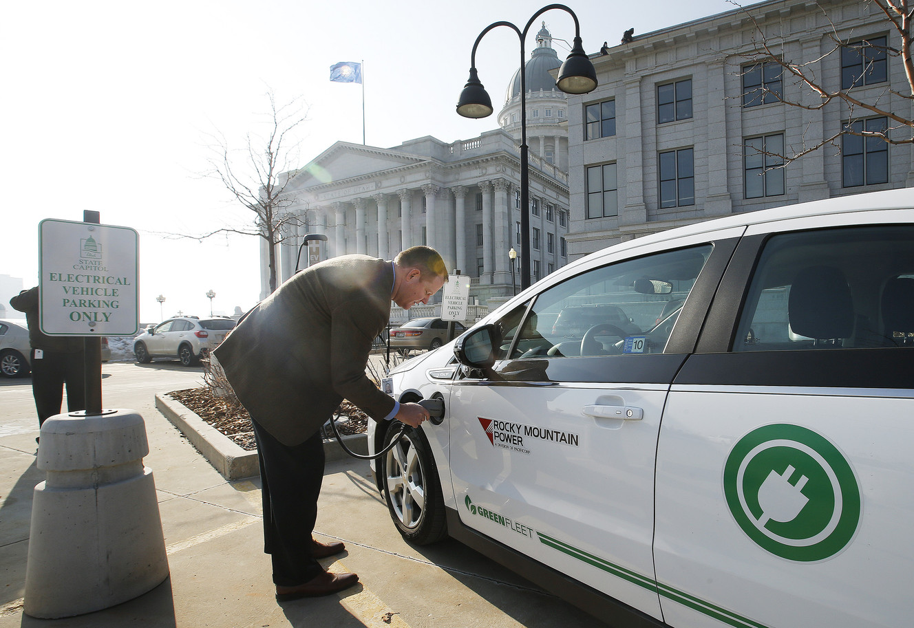 Rocky Mountain Power's Bryan Anderson charges his electric car at the state Capitol in Salt Lake City on Wednesday, Jan. 18, 2017. (Photo: Jeffrey D. Allred, Deseret News)