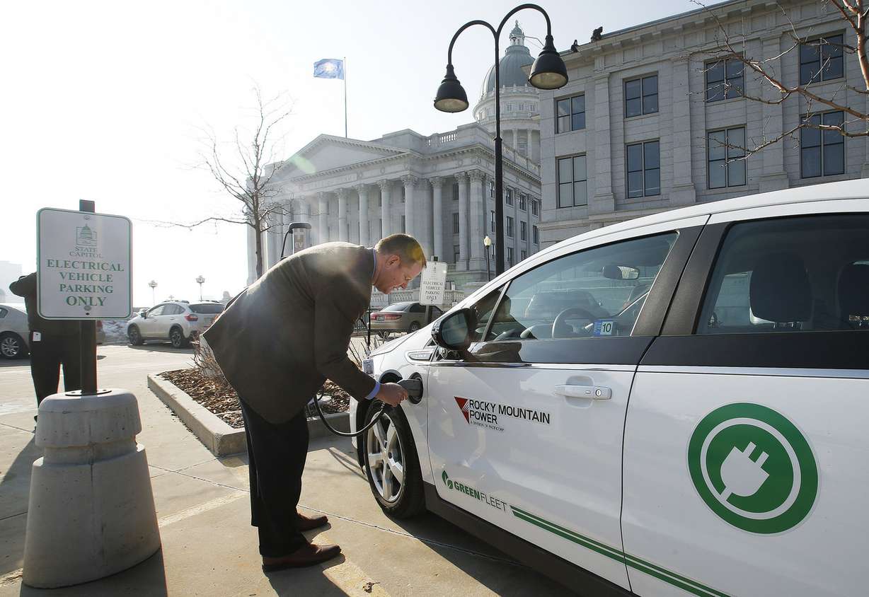 Rocky Mountain Power's Bryan Anderson charges his electric car at the state Capitol in Salt Lake City on Wednesday, Jan. 18, 2017. (Photo: Jeffrey D. Allred, Deseret News)