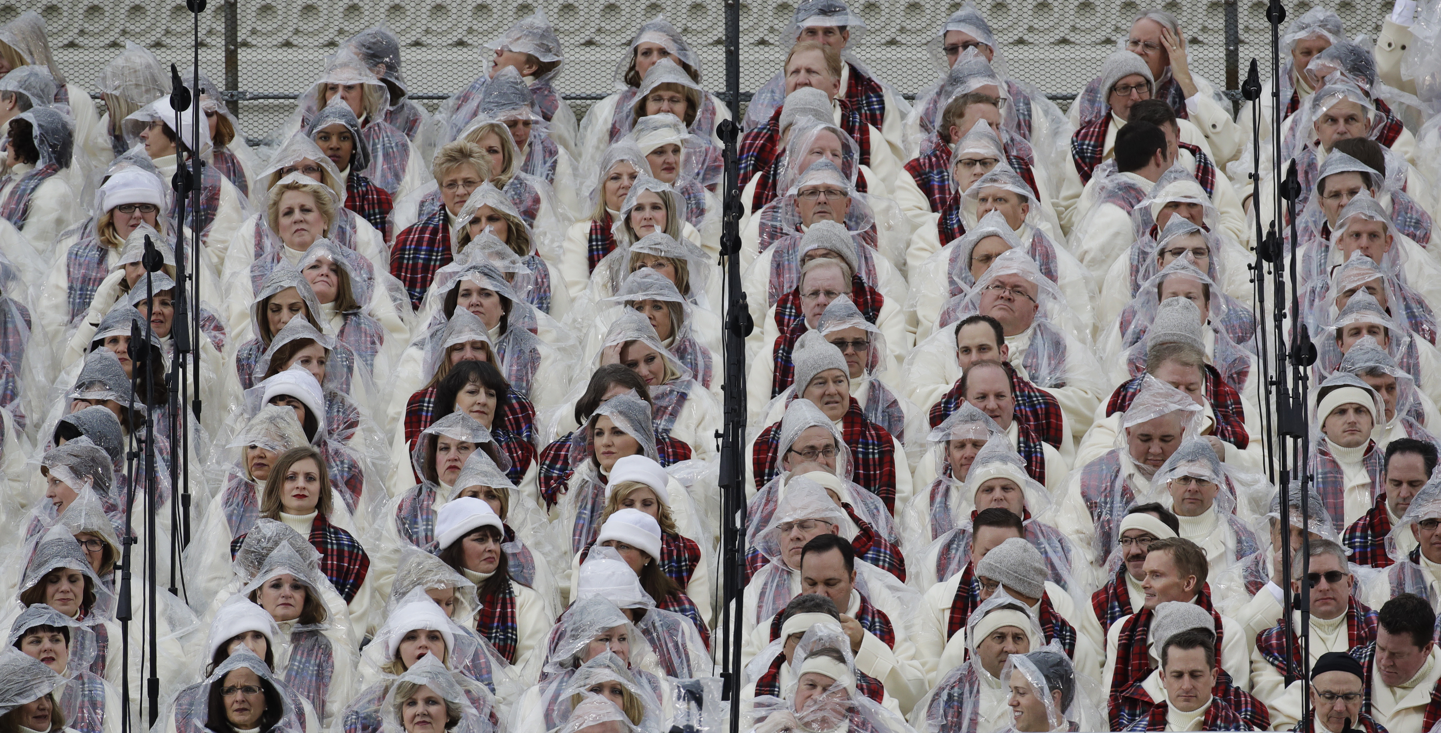 Members of the Mormon Tabernacle Choir wait for the swearing in of Donald Trump as the 45th president of the Untied States during the 58th Presidential Inauguration at the U.S. Capitol in Washington. Friday, Jan. 20, 2017 (AP Photo/Patrick Semansky)