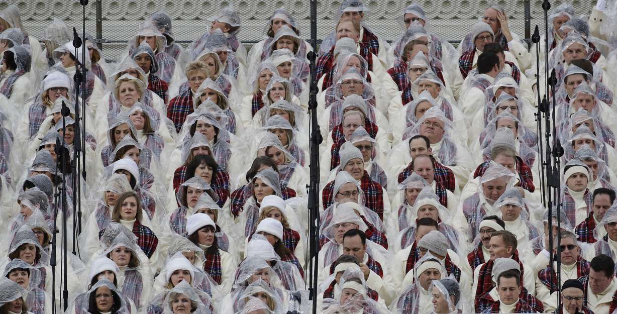 Members of the Mormon Tabernacle Choir wait for the swearing in of Donald Trump as the 45th president of the Untied States during the 58th Presidential Inauguration at the U.S. Capitol in Washington. Friday, Jan. 20, 2017 (AP Photo/Patrick Semansky)