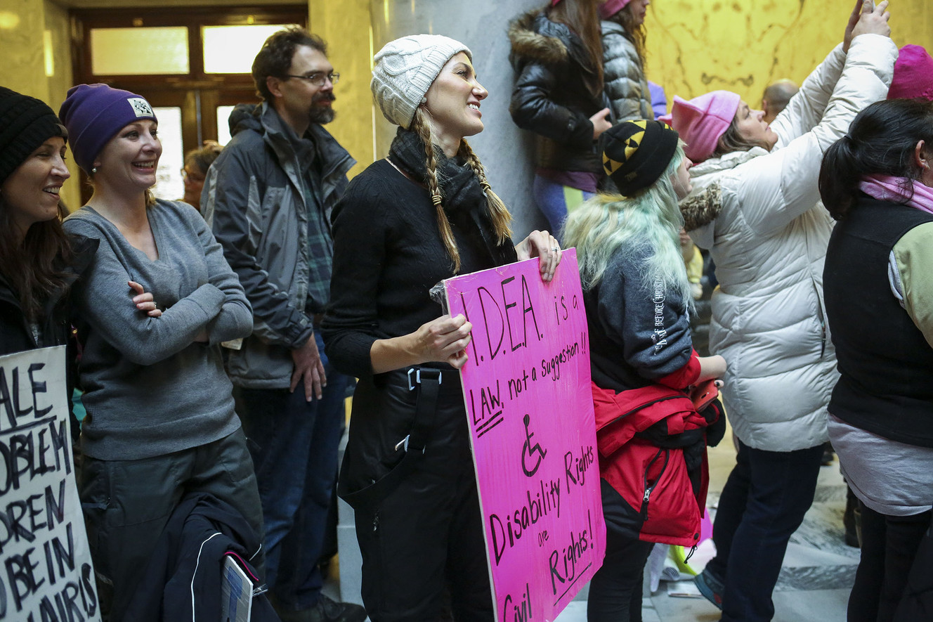 Abigail Wright, middle, has a son with hearing loss due to CMV. She attended the Women's March at the state Capitol in Salt Lake City on Monday, Jan. 23, 2017, to advocate for disability rights. Photo: Nicole Boliaux, Deseret News