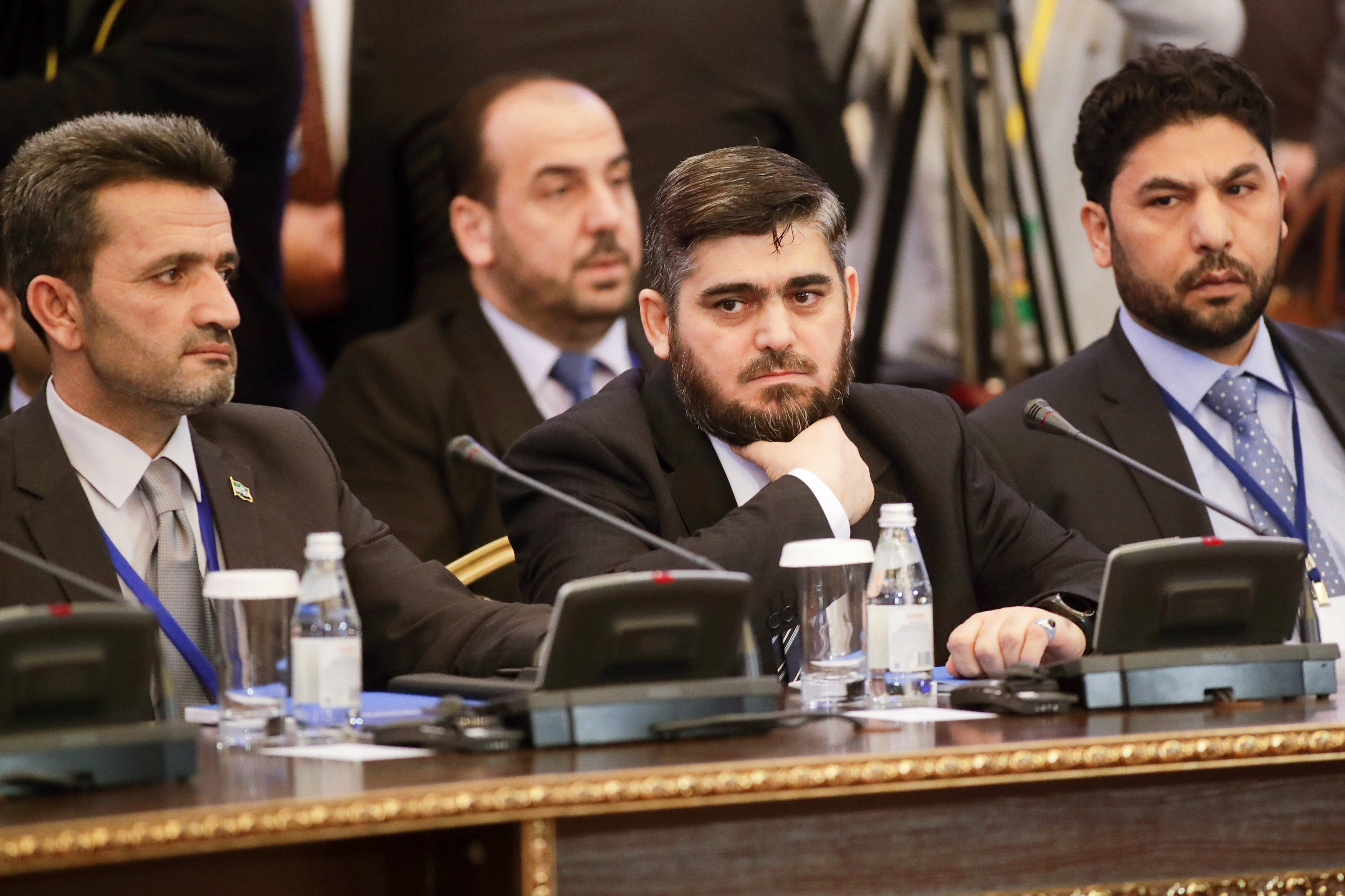 Syria's motley crew of fighters now at negotiating table