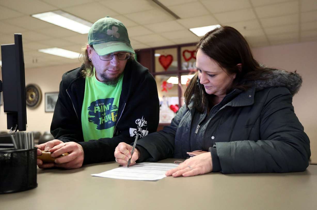 Dan Christensen and Amy Brady apply for a marriage license at the Salt Lake County Clerk's Office in Salt Lake City on Wednesday, Jan. 25, 2017. Photo: Kristin Murphy, Deseret News