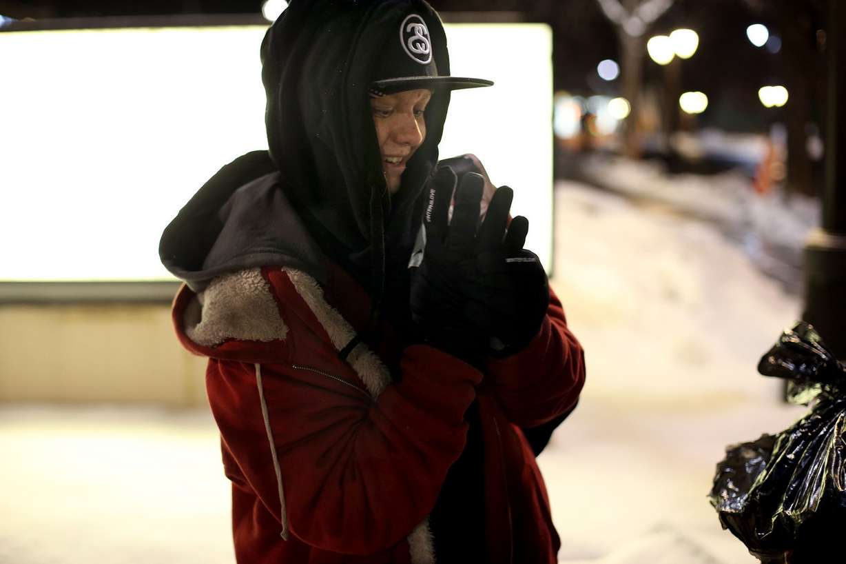 Jessica World admires new gloves that she received from Volunteers of America-Utah employees during the annual Point-in-Time Count in Sugar House on Thursday, Jan. 26, 2017. (Photo: Laura Seitz, Deseret News)