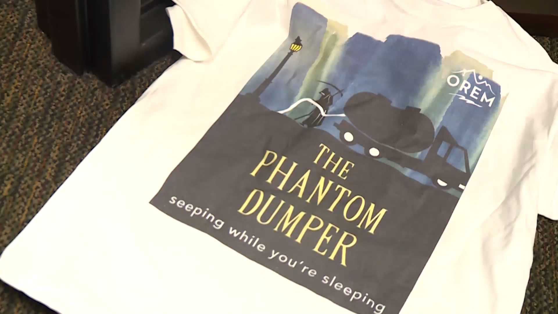 Orem City administrators created a "Phantom Dumper" T-shirt to help spread the word they are looking for the person responsible for dumping an unknown substance into the city's sewers. (Photo: Ray Boone, KSL TV)