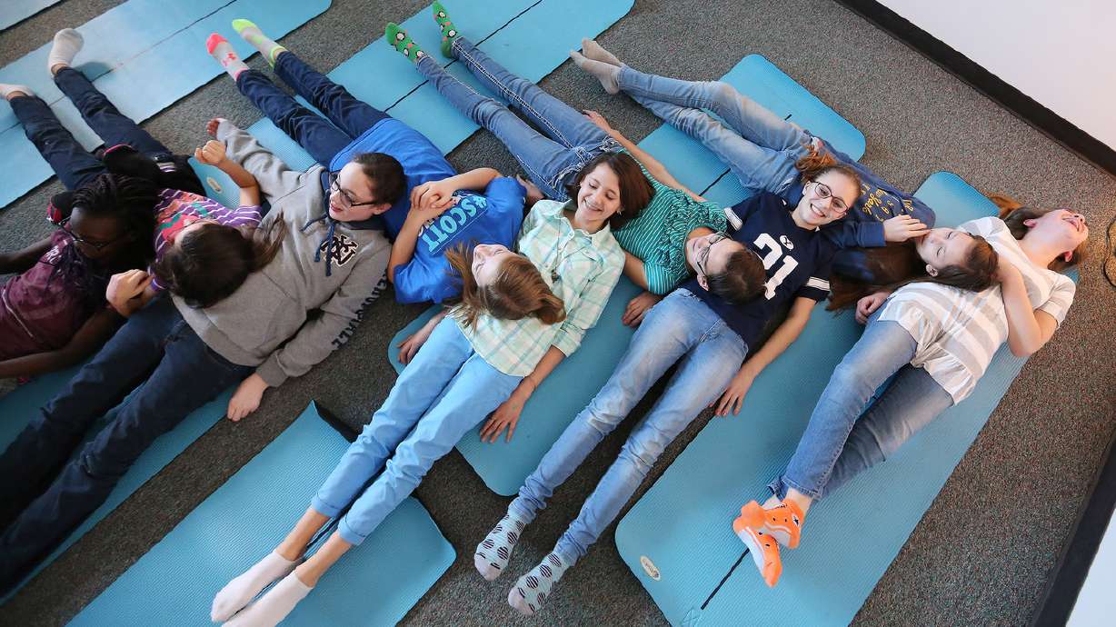 West Jordan Middle School using yoga to reduce student stress