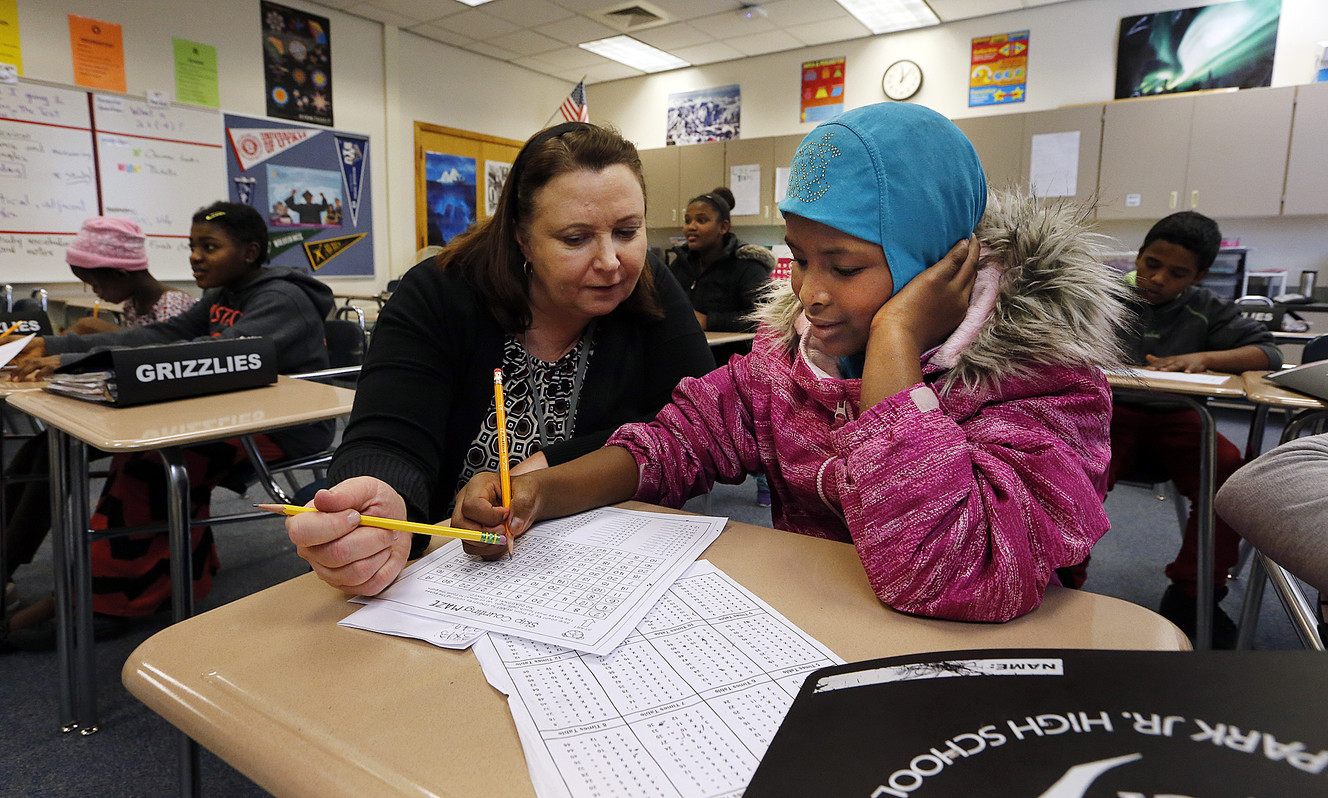 Teacher Nancy Farnsworth helps student Sahra Dirye with math at Granite Park Junior High in South Salt Lake on Friday, Jan. 27, 2017. (Photo: Ravell Call, Deseret News)