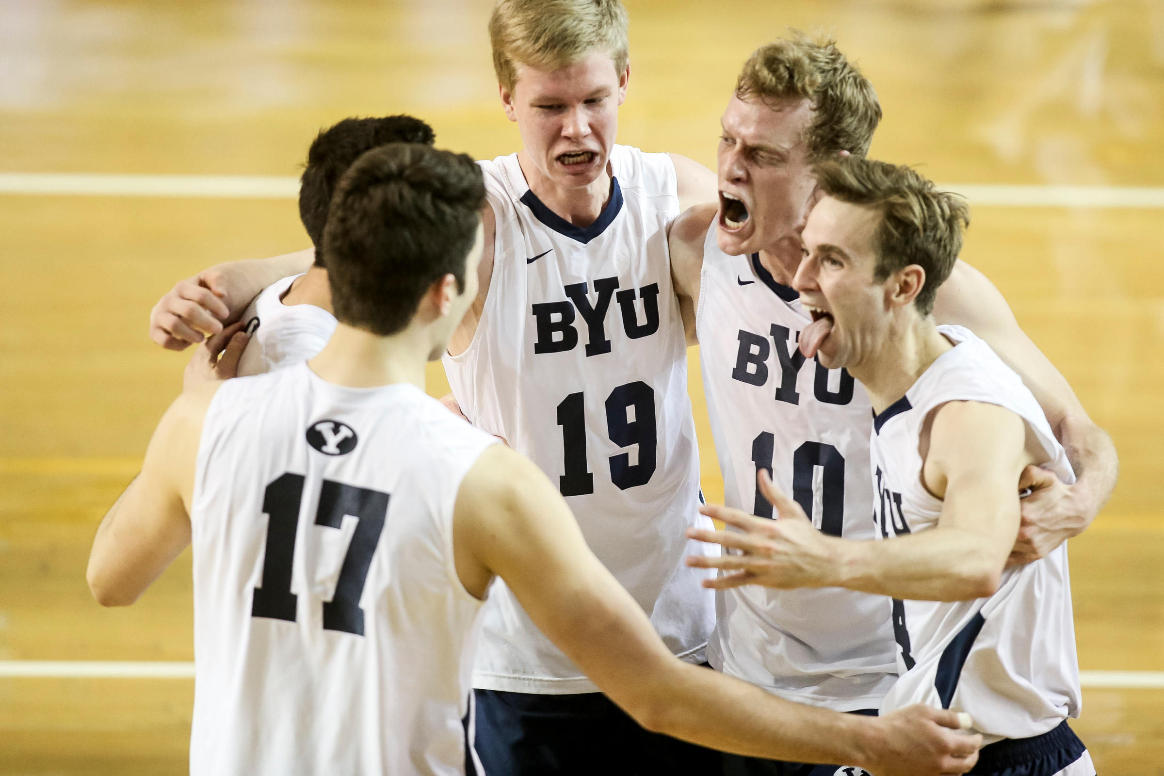 BYU's Joseph Grosh (17), Brenden Sander (15), Miki Jauhiainen (19), Jake Langlois (10) and Leo Durkin (4) celebrate a point over UC Irvine during the match at the Smith Fieldhouse in Provo on Friday, Jan. 27, 2017. (Photo: Spenser Heaps, Deseret News)