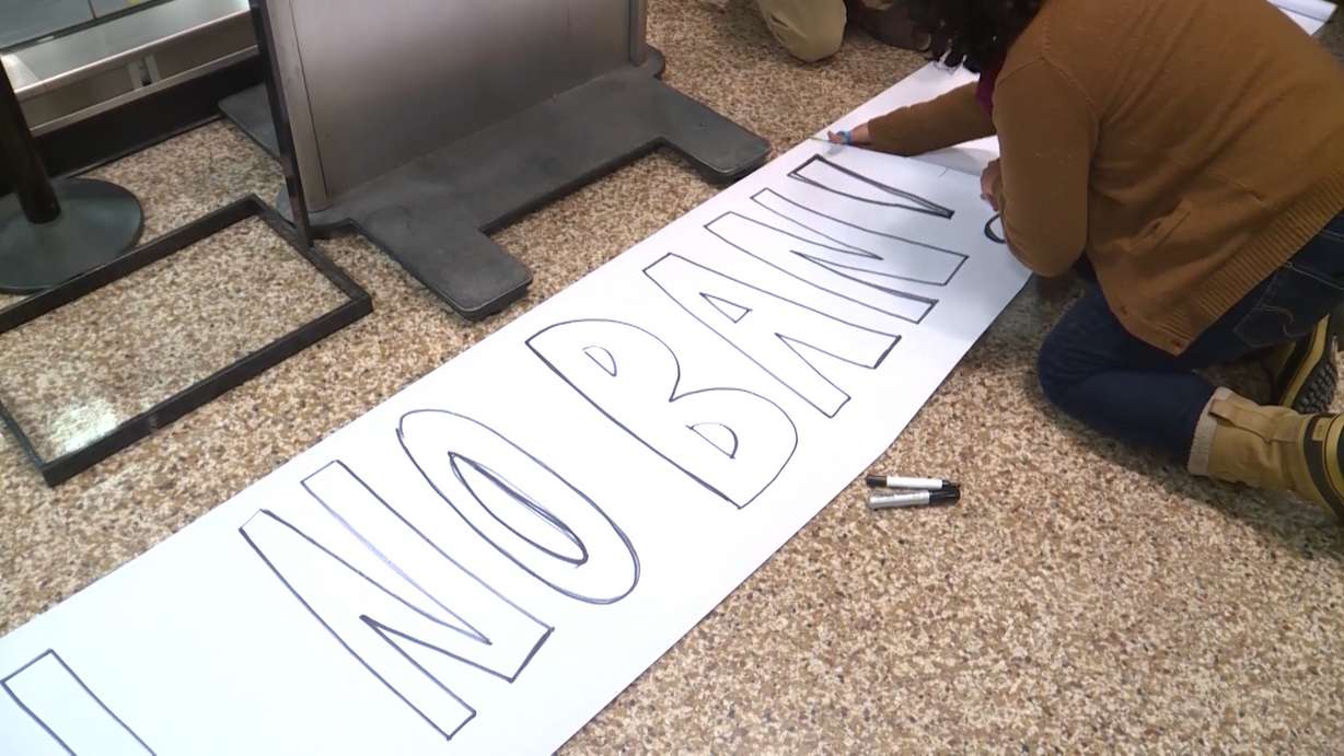 About 100 protesters picketed at the Salt Lake City International Airport Saturday night, speaking out against President Donald Trump's executive orders on immigration intended to halt refugees from majority-Muslim countries entering the U.S. (Tanner Siegworth, KSL TV)