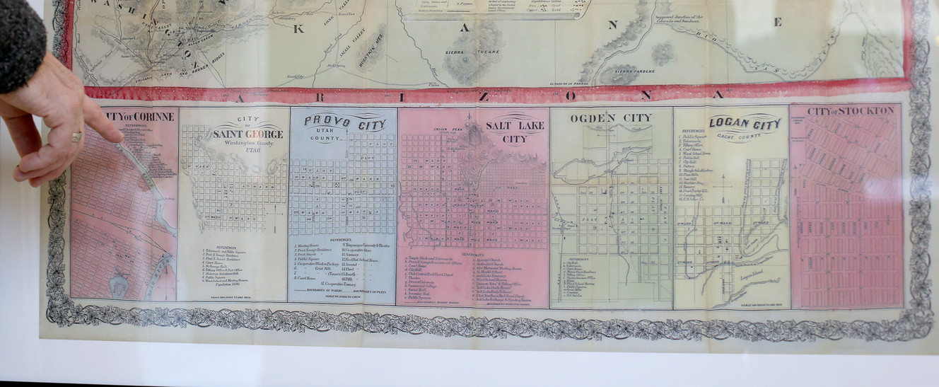 Stephen Boulay points out the major cities of Utah on a rare map at an exhibit on the fourth floor of the Capitol in Salt Lake City on Friday, Jan. 27, 2017. (Photo: Laura Seitz, Deseret News)