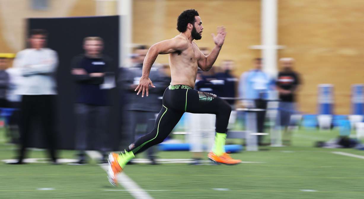 Devin Mahina runs the 40 yard run as BYU holds pro day Friday, March 27, 2015, in Provo at their indoor practice facility. Mahina will suit up for the Salt Lake Screaming Eagles, a fan-run franchise in the Indoor Football League, this spring. (Photo: Scott G Winterton, Deseret News)