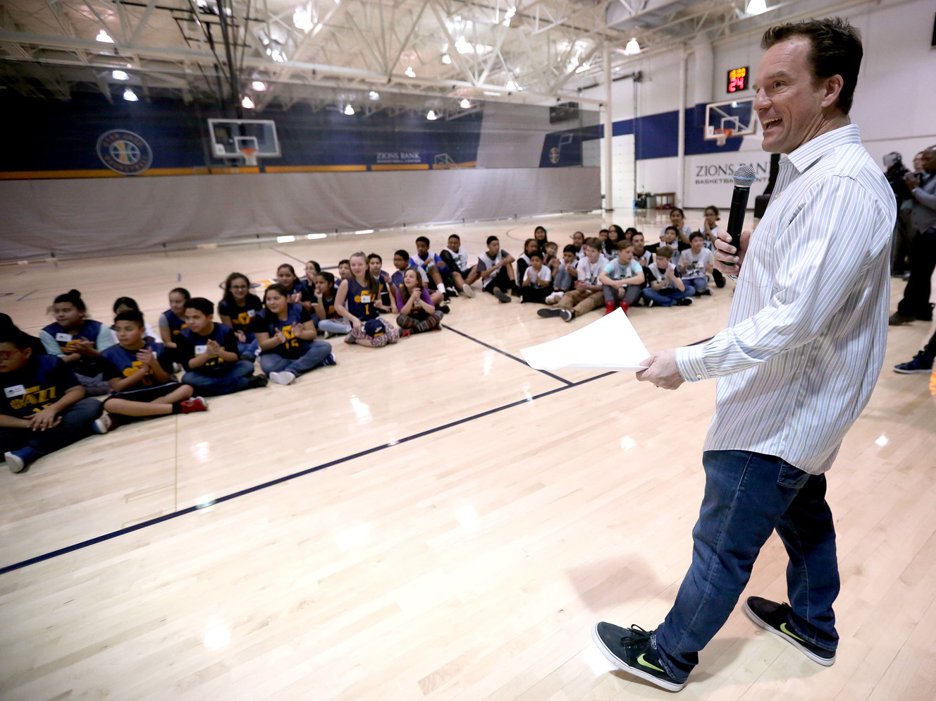 David Locke talks to students from Franklin and Bryant middle schools before the start of NBA Math Hoops with the Utah Jazz at the Zions Bank Basketball Center in Salt Lake City on Monday, Jan. 30, 2017. (Photo: Kristin Murphy, Deseret News)