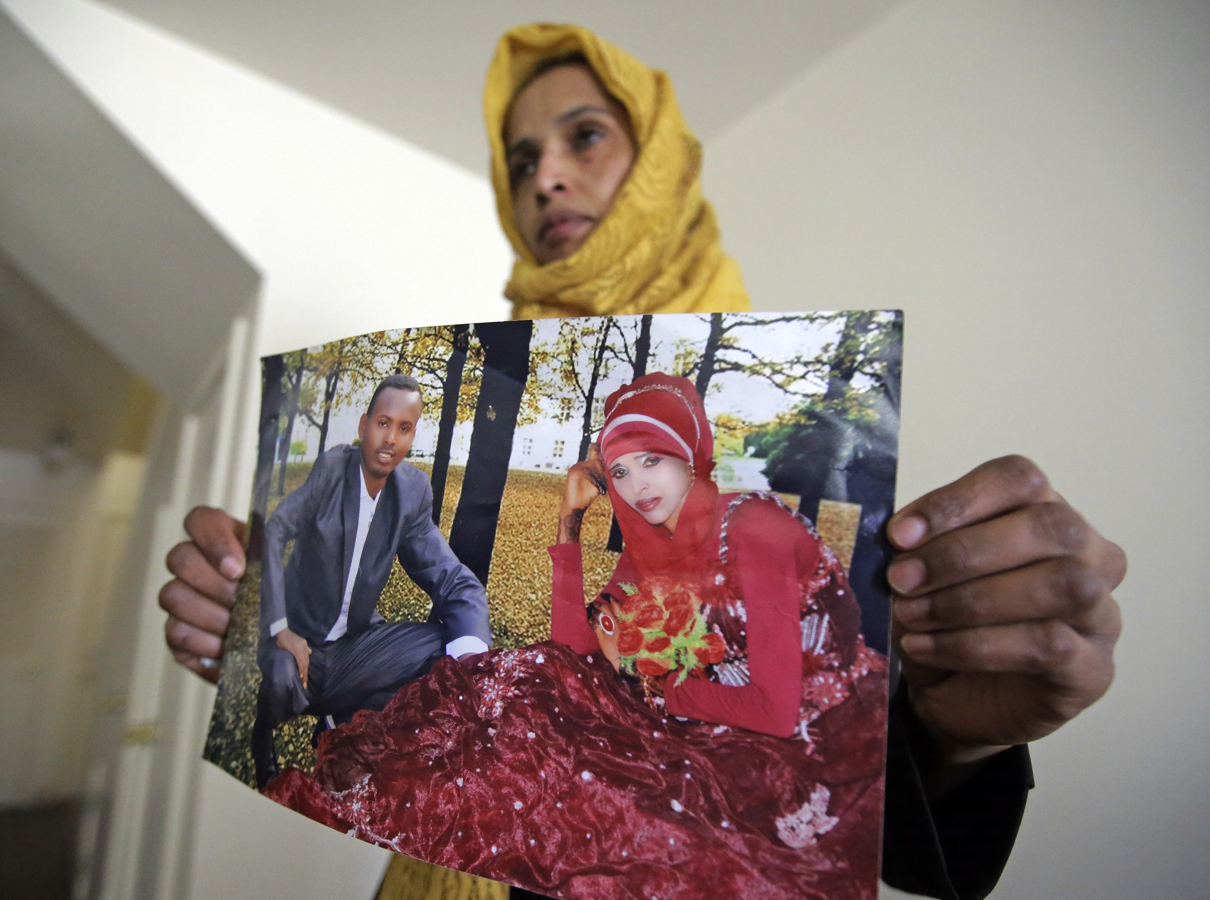 Somali refugee Nimo Hashi holds a photo of her husband Tuesday, Jan. 31, 2017, in Salt Lake City. (Photo: Rick Bowmer, AP Photo)