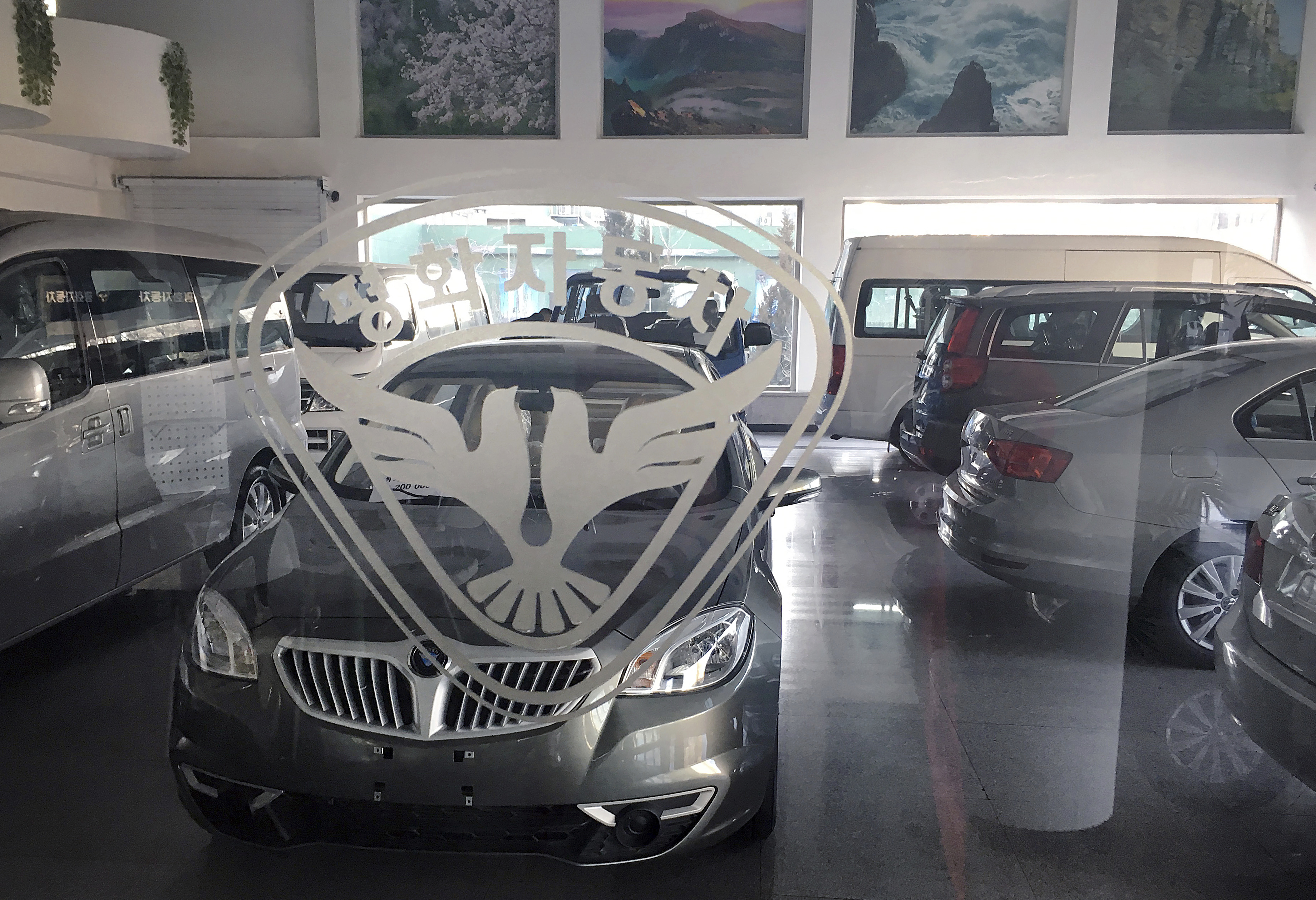 At a Pyongyang car dealership, only the logos are local