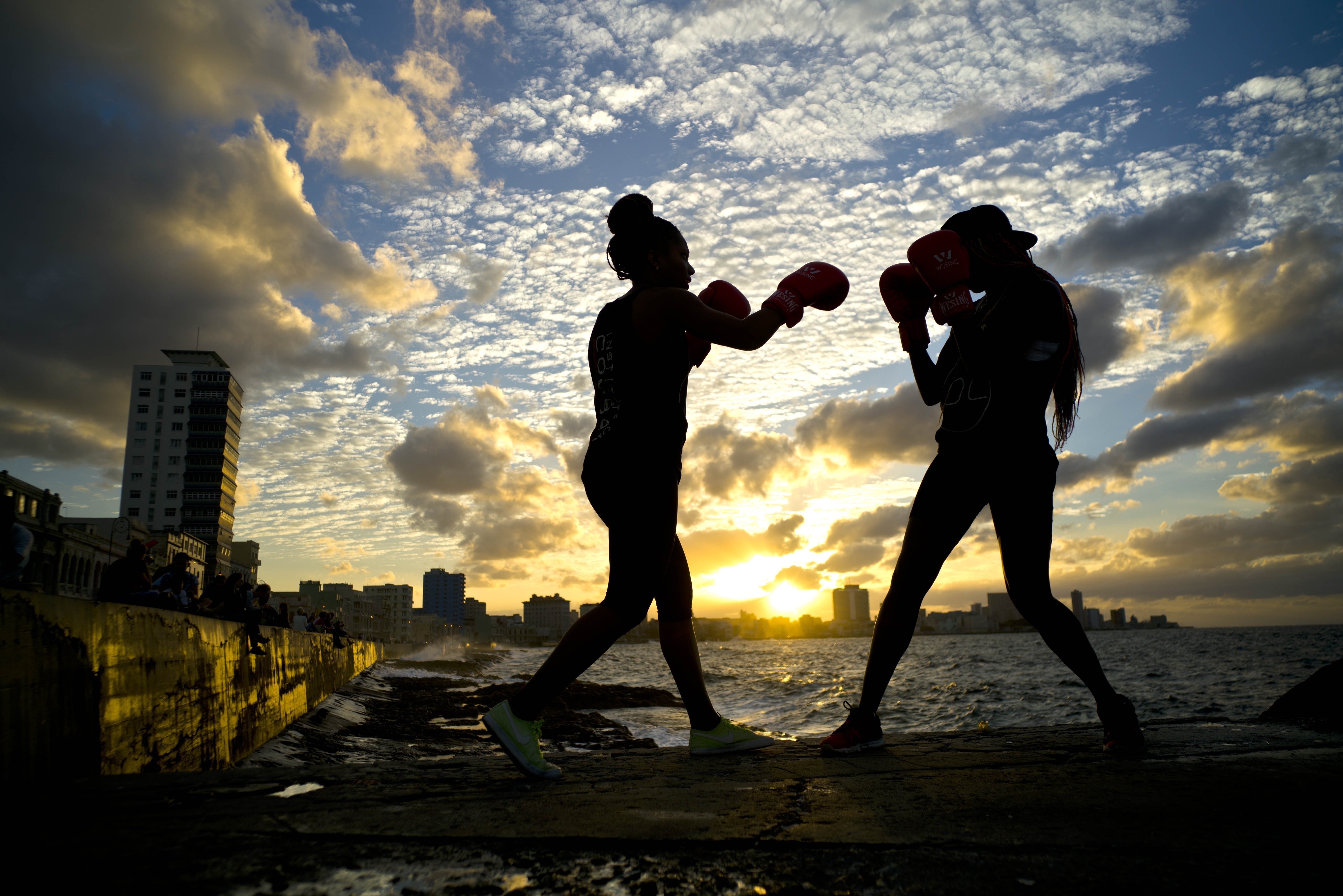 AP PHOTOS: Women demand Cuba support 1st female boxing team