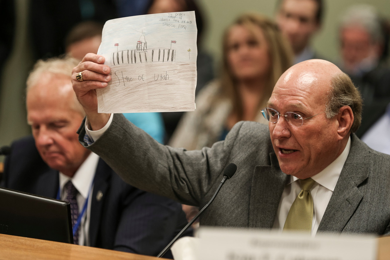 Douglas White, an attorney who has worked polygamy cases, speaks in favor of HB99, which amends Utah bigamy laws, at the Capitol in Salt Lake City on Wednesday, Feb. 1, 2017. White is showing a drawing of the Capitol by a 13-year-old to emphasize the young age of children abused in polygamist groups. (Photo: Spenser Heaps, Deseret News)