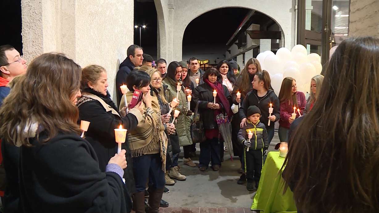 Carmen “Jackie” Lindhardt died a year ago when she fell into an industrial dough mixer at the bakery of Ream’s Food Store in Sandy. Friday night, her family and friends gathered to remember her. (KSL TV)