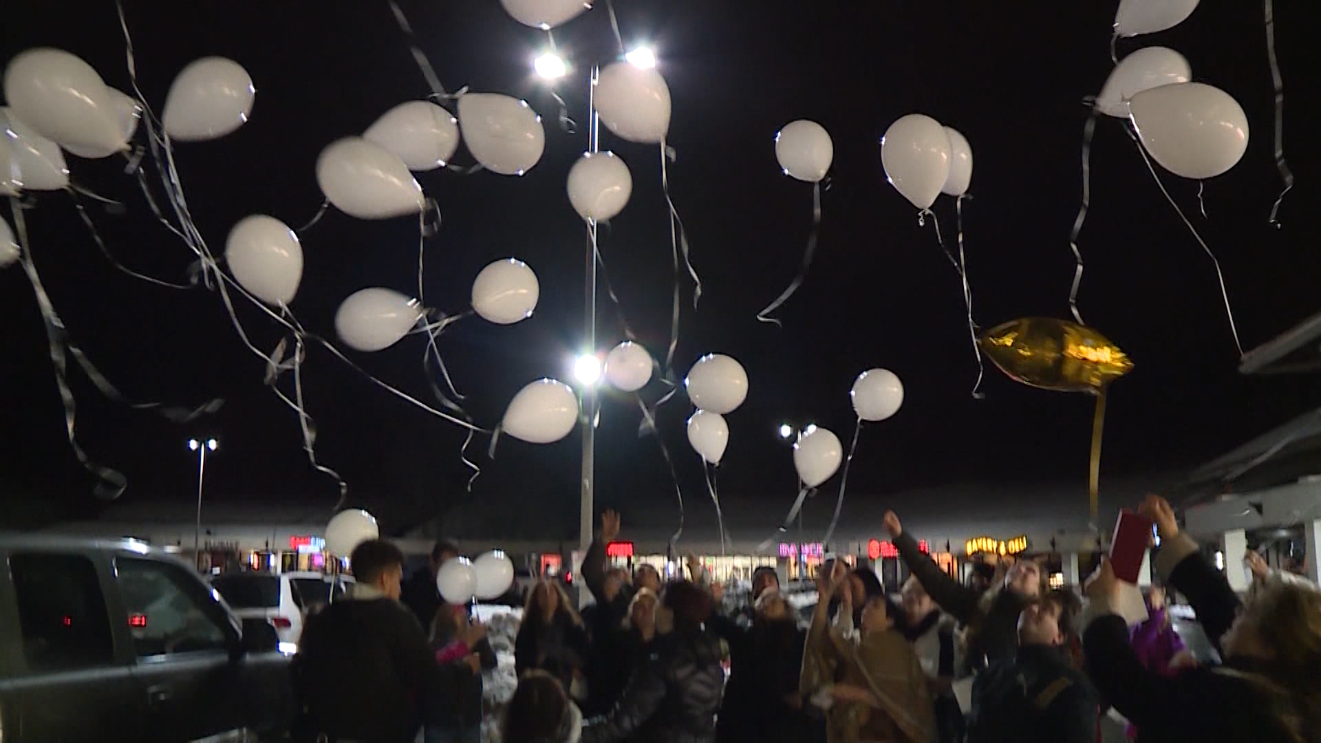 Carmen “Jackie” Lindhardt died a year ago when she fell into an industrial dough mixer at the bakery of Ream’s Food Store in Sandy. Friday night, her family and friends gathered to remember her. (KSL TV)