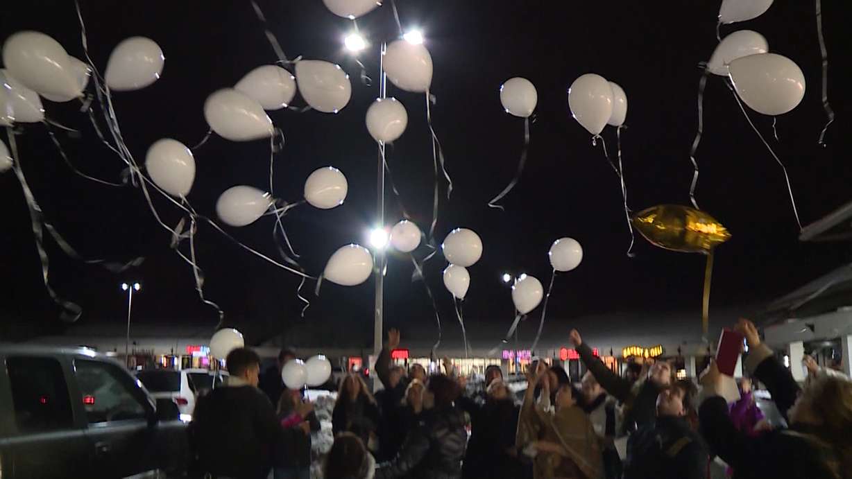 Carmen “Jackie” Lindhardt died a year ago when she fell into an industrial dough mixer at the bakery of Ream’s Food Store in Sandy. Friday night, her family and friends gathered to remember her. (KSL TV)