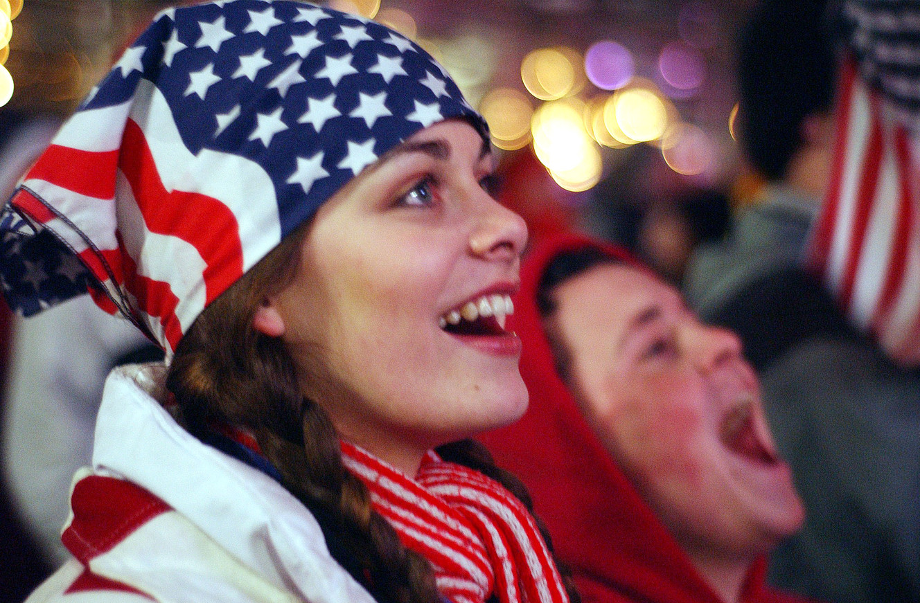 Britney Taylor and Blake Sarlo, from Ogden, watch the Opening Ceremony of the 2002 Olympic Winter Games at the Gallivan Center, Friday, Feb. 8, 2002. (Photo: Jeremy Harmon, Deseret News, File)