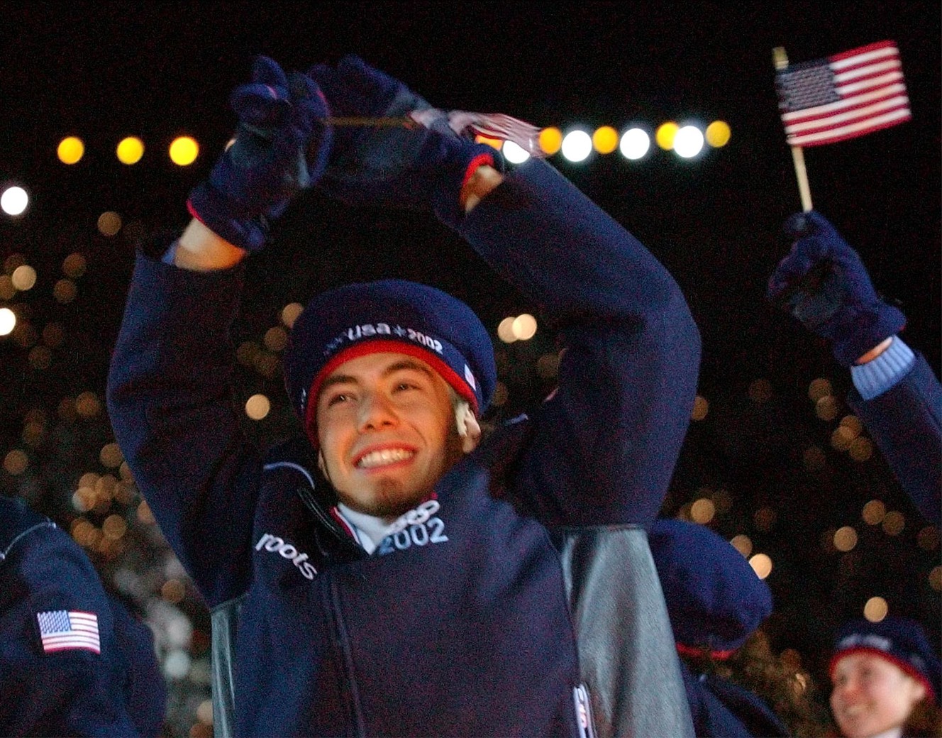 USA Short Track speed skater Apollo Ohno waves to the crowd during the Salt Lake 2002 Olympic Winter Games Opening Ceremony at Rice-Eccles Stadium, Friday, Feb 8, 2002. (Photo: Laura Seitz, Deseret News, File)