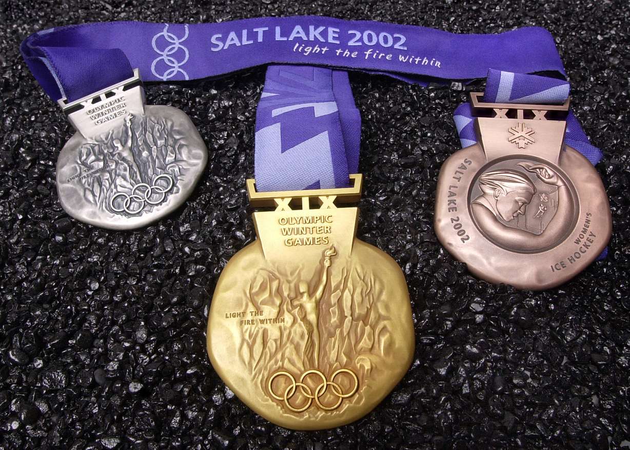 The Olympic medals for the 2002 Winter Games are displayed for the first time on Friday, Oct. 12, 2001, in Salt Lake City — months before the Games begin. (Photo: Douglas C. Pizac, AP Photo, File)